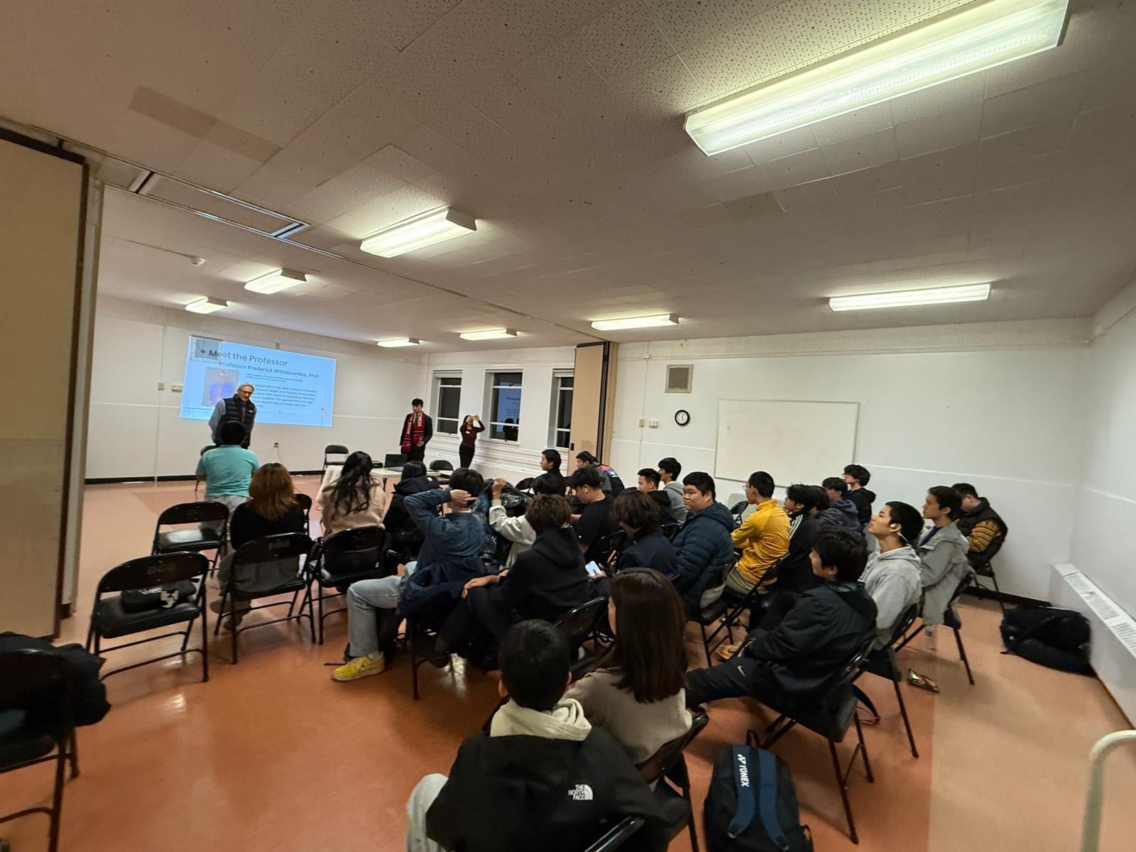 The audience and speakers gathered at the Striders EDU event
